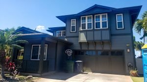 fresh exterior painting of two floors house with garage