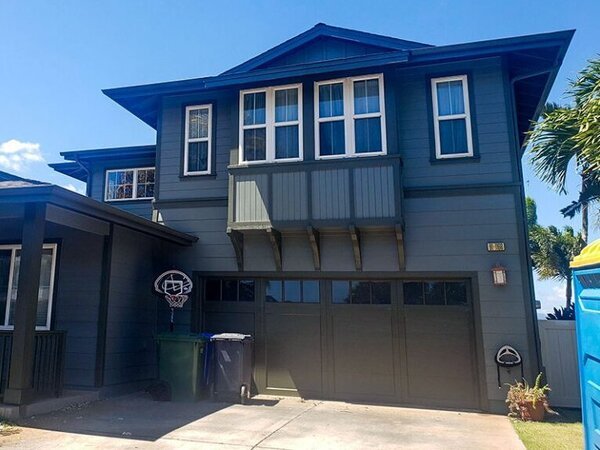 Exterior of a house in Hawaii painted a darker color