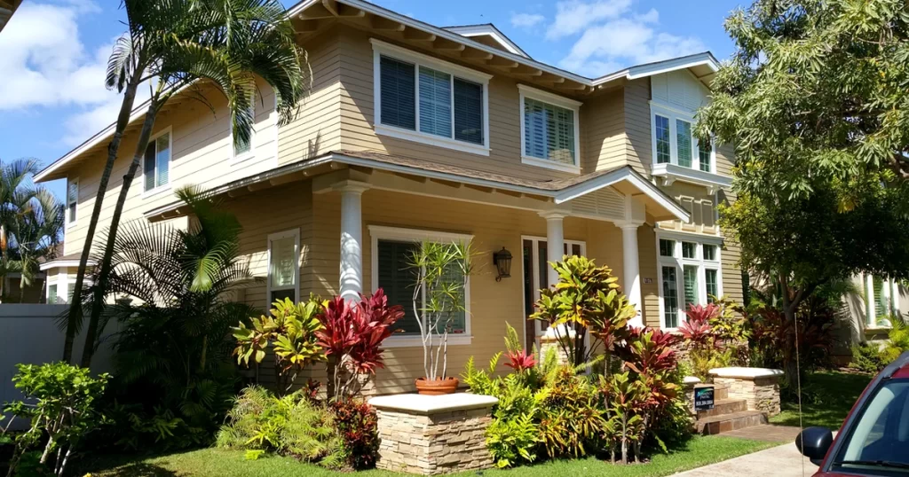 Two story beige house. Sherwin Williams paint.