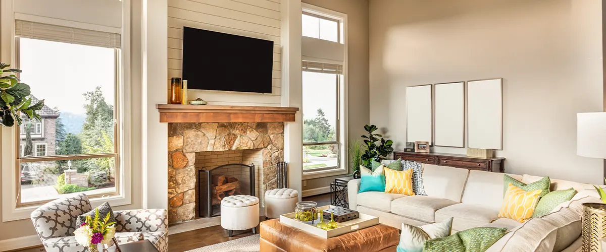 living room with fireplace and large windows