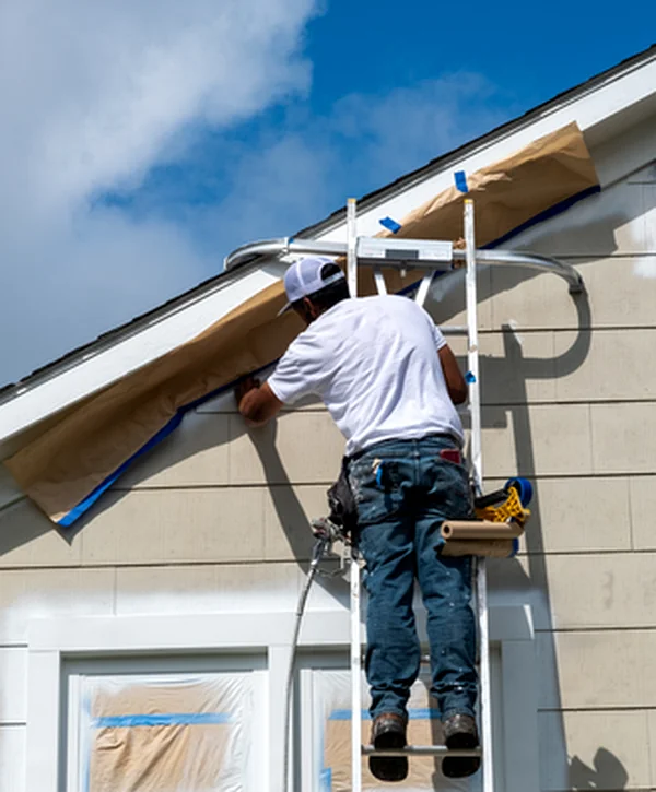 Top 6 Exterior Painting Companies in Waianae, HI 1 exterior painting waianae hi professional contractor expertly painting house exterior with commercial grade tools on ladder